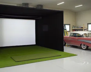 Golf simulator enclosure installed in a finished garage